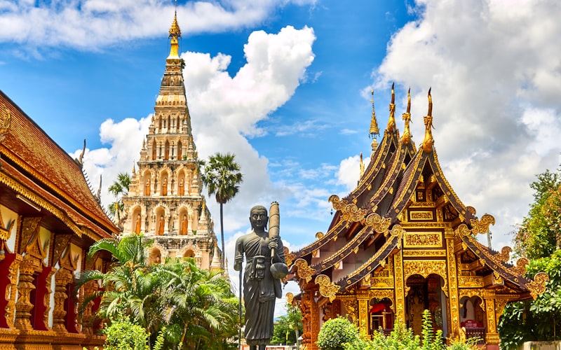 Chinatown Yaowarat street at night with neon signs and food stalls